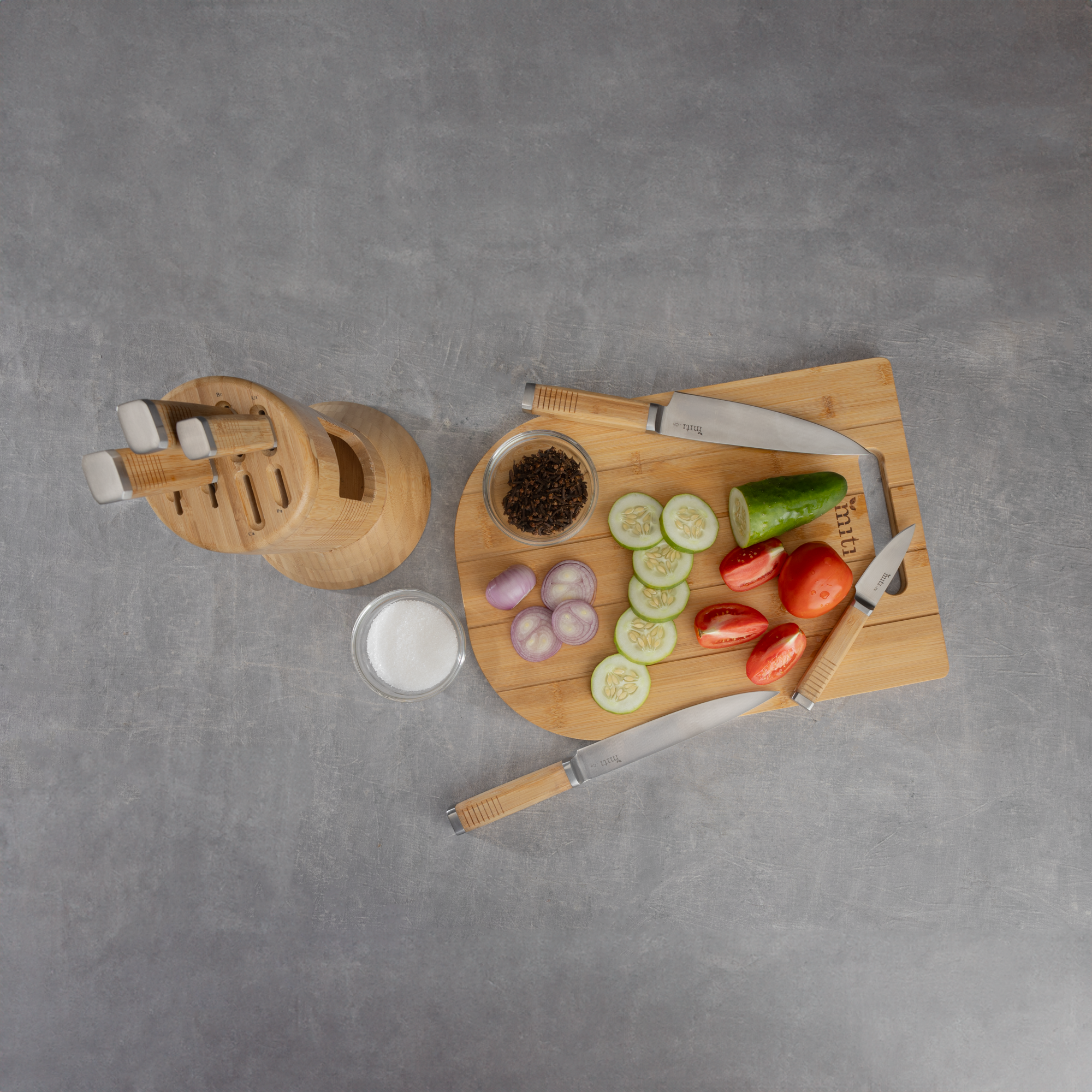 Photo showing MITI Life Knives and cutting board in use