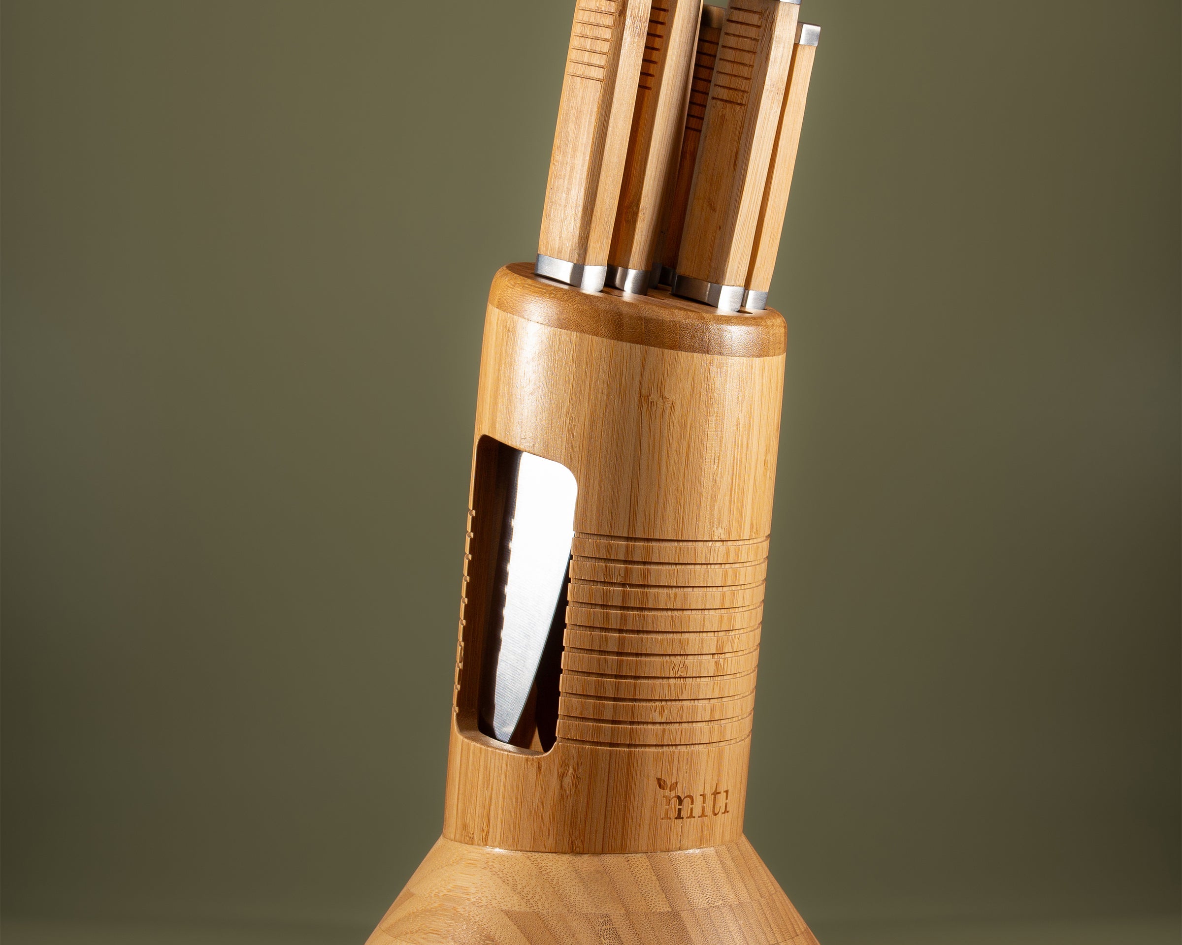 MITI six-piece kitchen knife set displayed in its bamboo storage block for everyday knife care