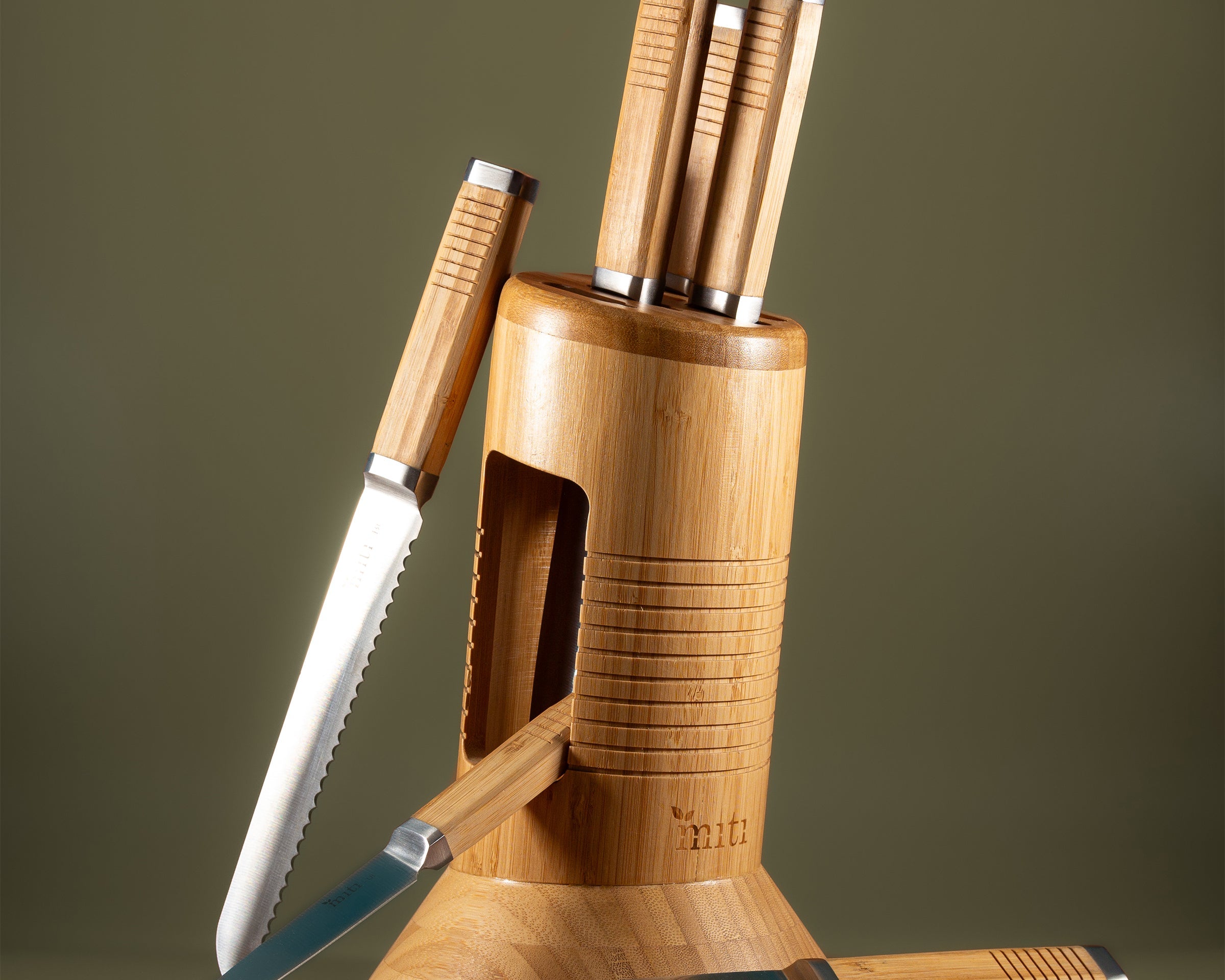 MITI six-piece kitchen knife set displayed in a bamboo storage block