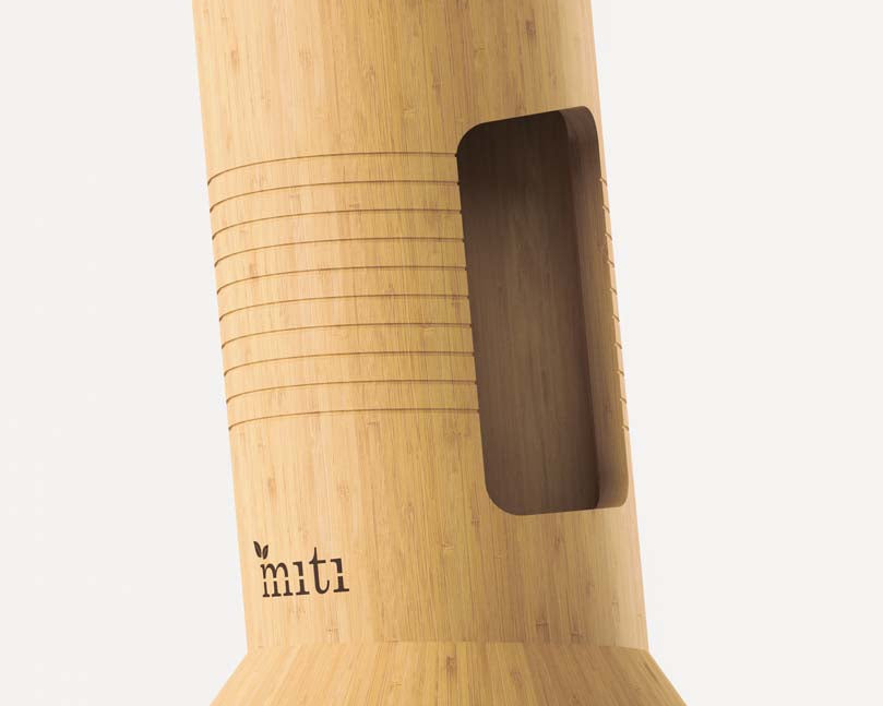 Close-up of MITI bamboo-handle kitchen knives for a chef’s knife and Santoku comparison