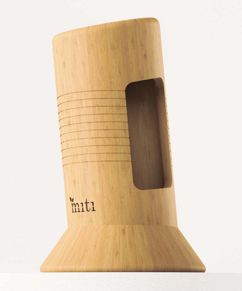 Close-up of MITI bamboo-handle kitchen knives for a chef’s knife and Santoku comparison