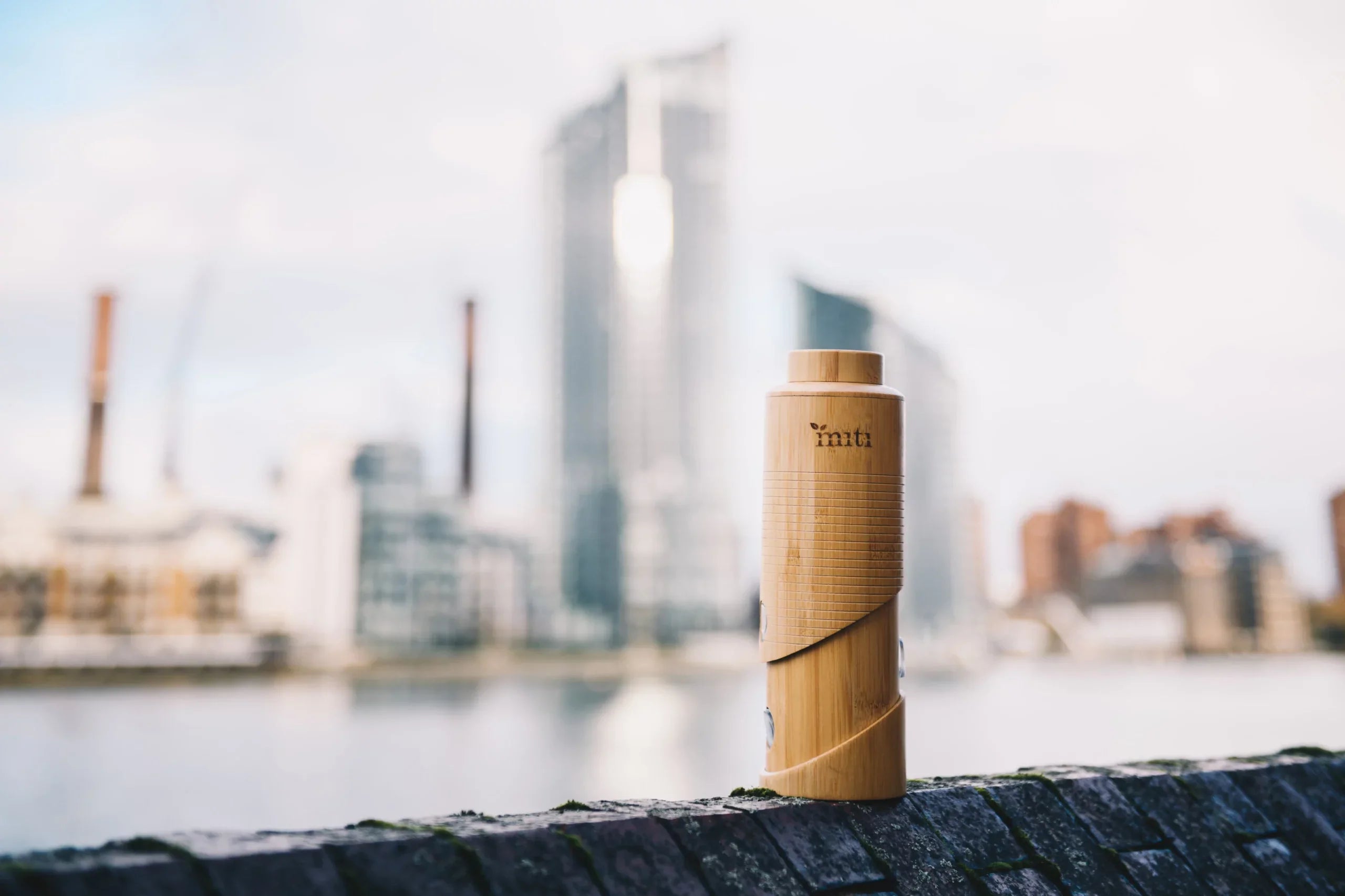 MITI bamboo water bottle photographed outdoors for a work-bag commuting guide