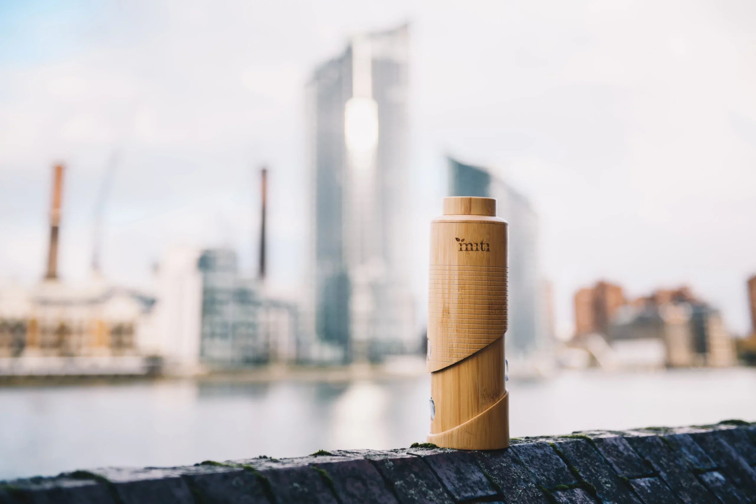MITI bamboo water bottle photographed outdoors for a work-bag commuting guide