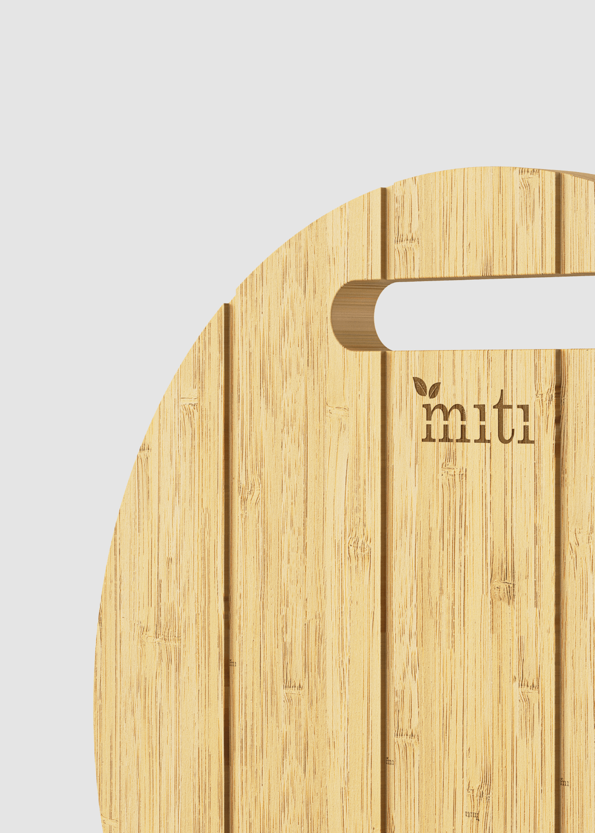 close up shot of the upper part and handle of rounded chopping board by MITI Life